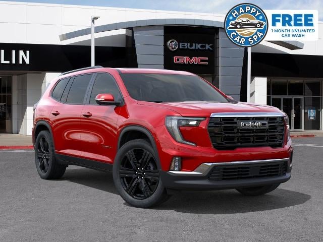 2026 GMC Acadia Elevation in Volcanic Red Tintcoat — front three-quarter view