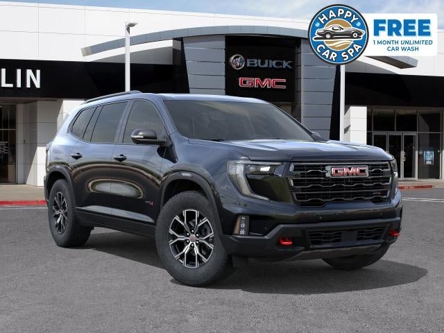 2026 GMC Acadia AT4 in Ebony Twilight Metallic — front three-quarter view