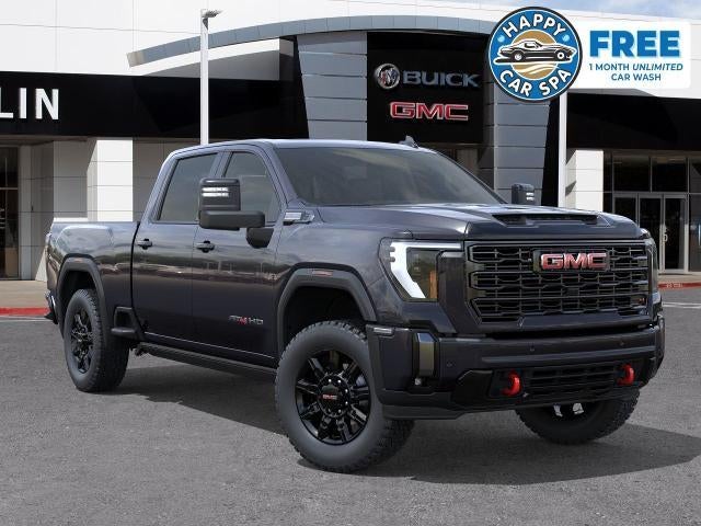 2026 GMC Sierra 2500 HD AT4 in Titanium Rush Metallic — front three-quarter view