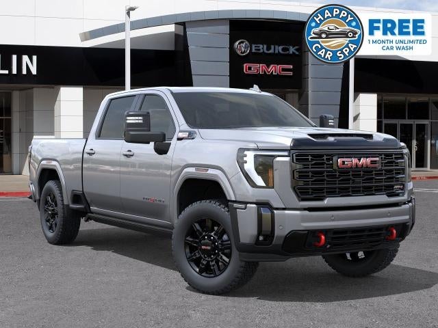 2026 GMC Sierra 2500 HD AT4 in Sterling Metallic — front three-quarter view