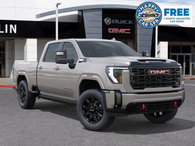 2026 GMC Sierra 2500 HD AT4 in Coastal Dune — front three-quarter view