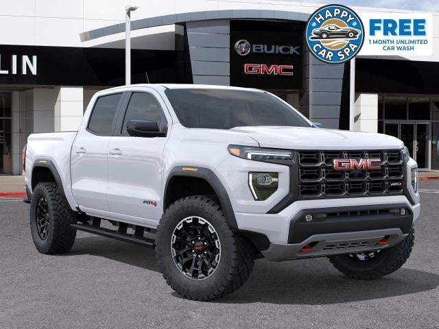 2026 GMC Canyon AT4 in Summit White — front three-quarter view