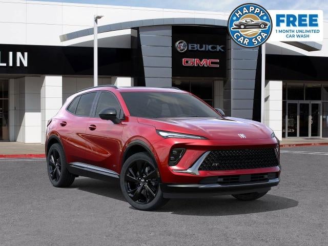 2026 Buick Envision Sport Touring in Brilliant Red — front three-quarter view