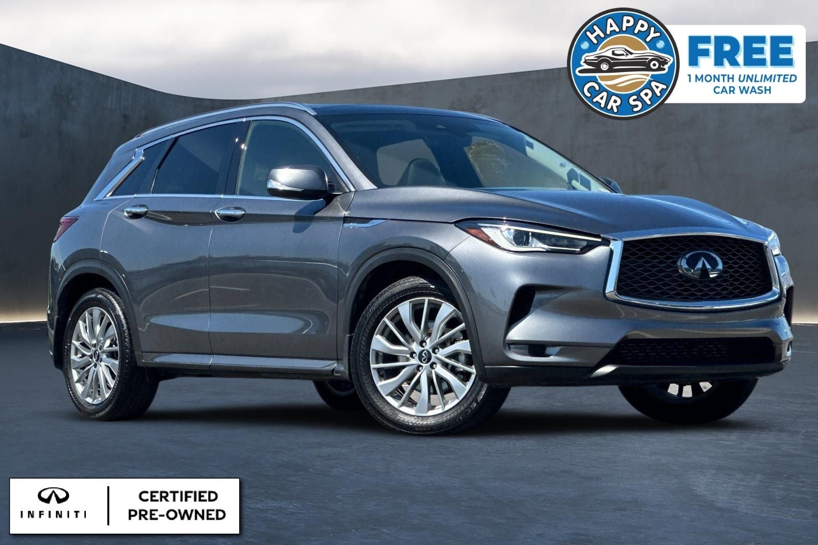 2025 INFINITI QX50 LUXE in Graphite Shadow — front three-quarter view
